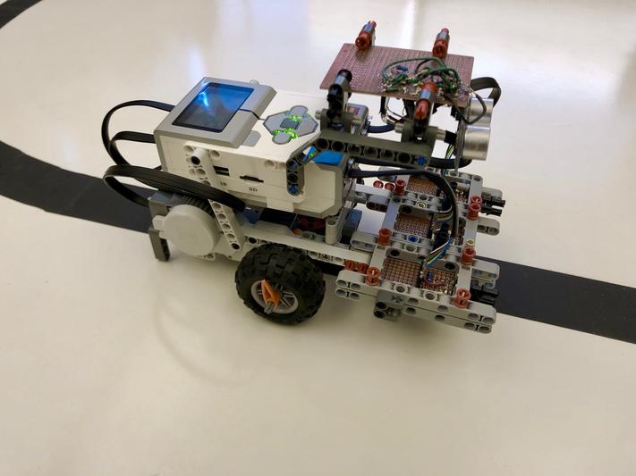 A line following robot comprised of a Lego EV3 and hand-soldered sensor circuits