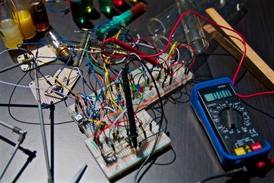 EE lab equipment spread across a desk